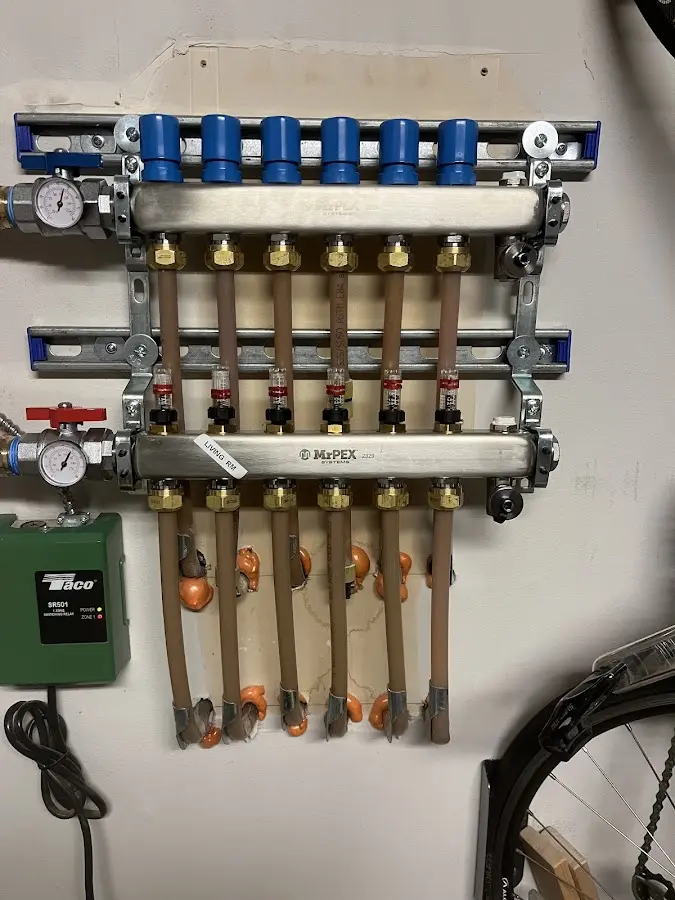 Plumber performing Water Heater Repair at a residential property in Woodcliff Lake